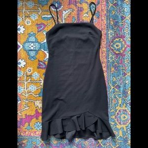 Sunset + Spring black cocktail dress in a size medium.